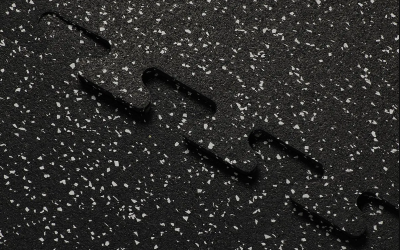 Rubber tile on a playground in alternating colors